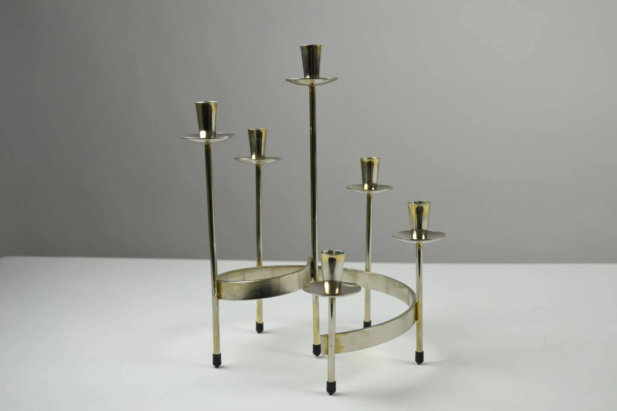 Pair of white metal candle holders "Spiral" by Gunnar Ander for Ystad-Metall, Sweden, 1960s.