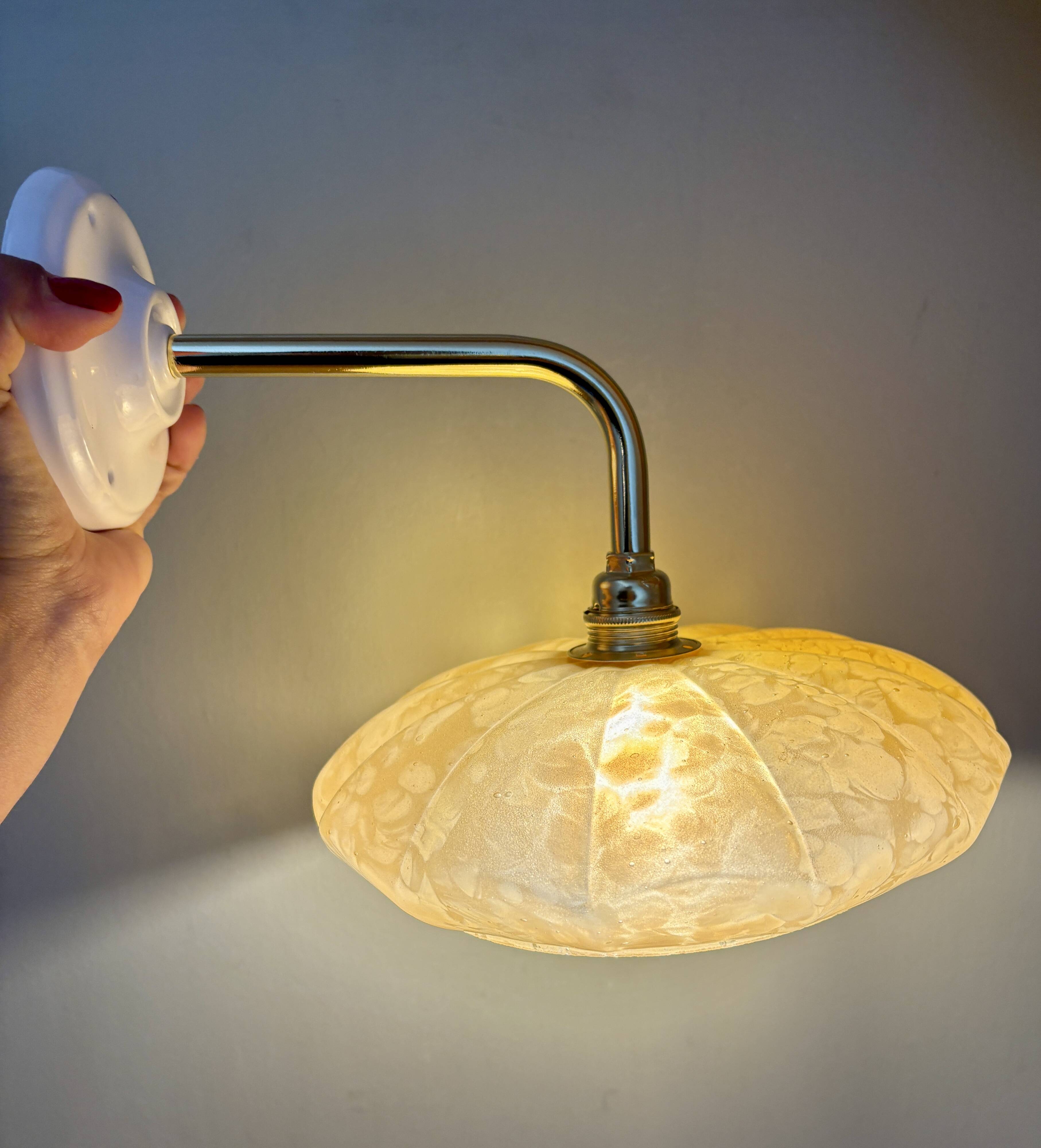 Antique wall lamp with yellow Clichy glass shade