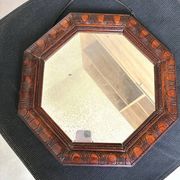 Octagonal mirror, glossy varnished oak, Art Deco.