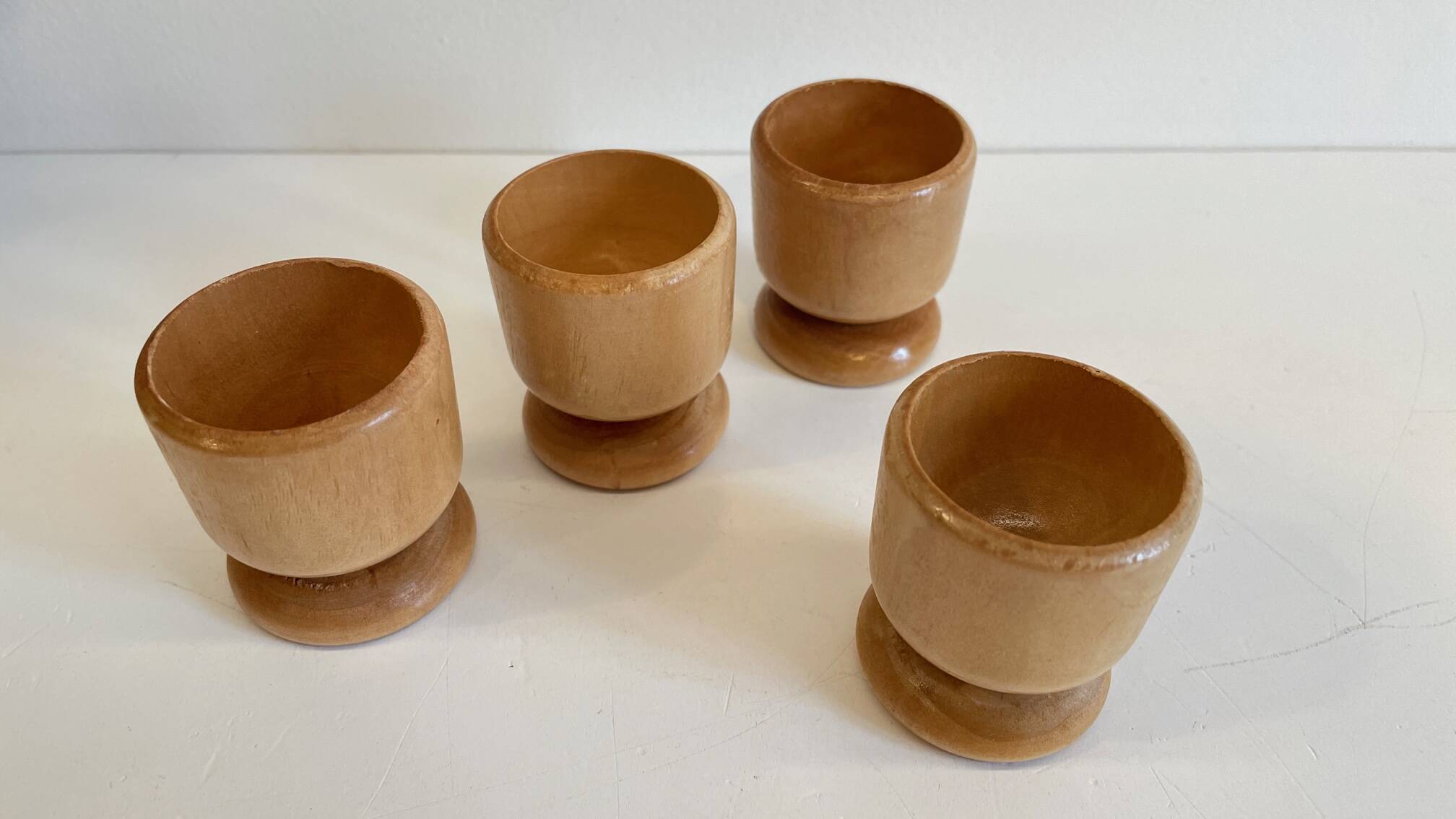 4 vintage turned wooden egg cups