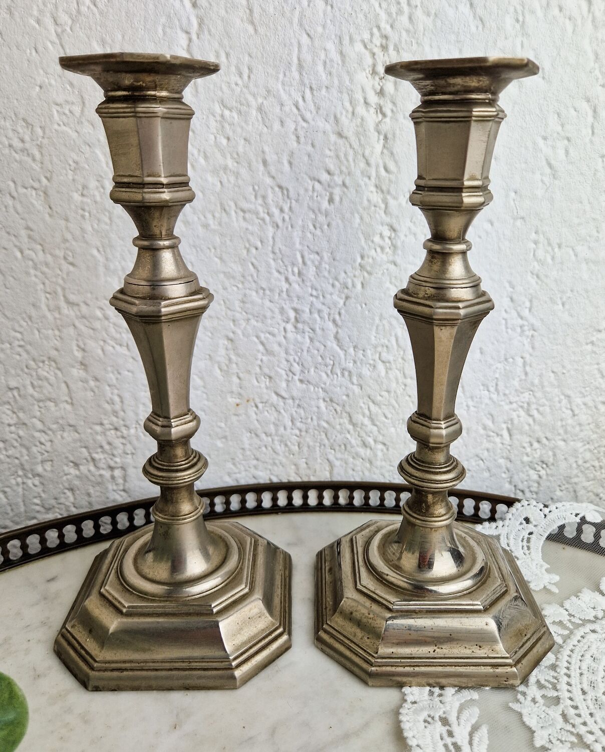 Pair of neo classical style candle holders in silver metal