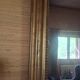Large Louis Philippe mirror with a gilded wooden frame.