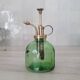 Ancien vaporisateur en laiton et verre