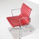 "EA 108" armchair in red leather, designed by Charles and Ray Eames for Vitra,