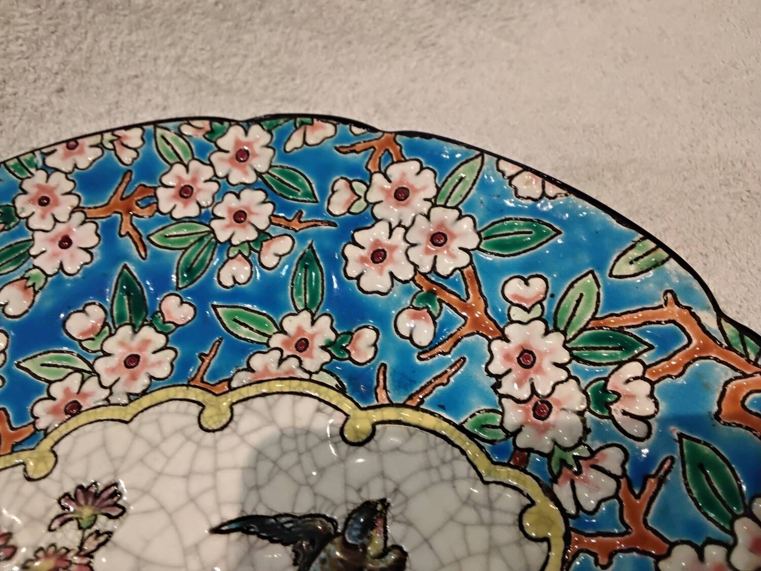 Longwy enamel plate with cartouche of 2 birds and apple blossoms, d188