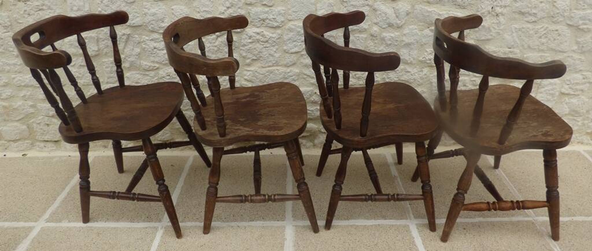 4 solid wood chairs in western style called "smockers chairs", in oak.