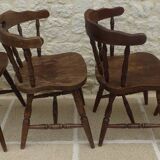 4 solid wood western-style "smoker's chairs" made of oak