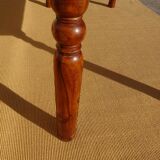 Solid wood and wrought iron table