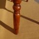 Solid wood and wrought iron table
