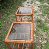 Pair of bamboo and smoked glass tables
