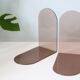Pair of smoked plexiglass bookends, 1970s