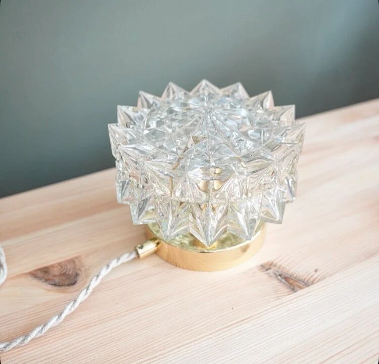 Table lamp with cut glass in the shape of a star.