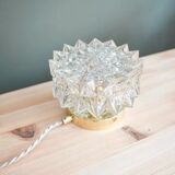 Table lamp with cut glass in the shape of a star.