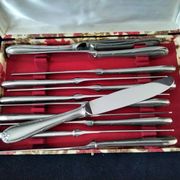 Set of 12 monobloc table knives in Comargent steel.