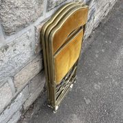 3 antique folding opera chairs in golden velvet and brass