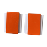 Pair of orange plexiglass wall sconces from the seventies.