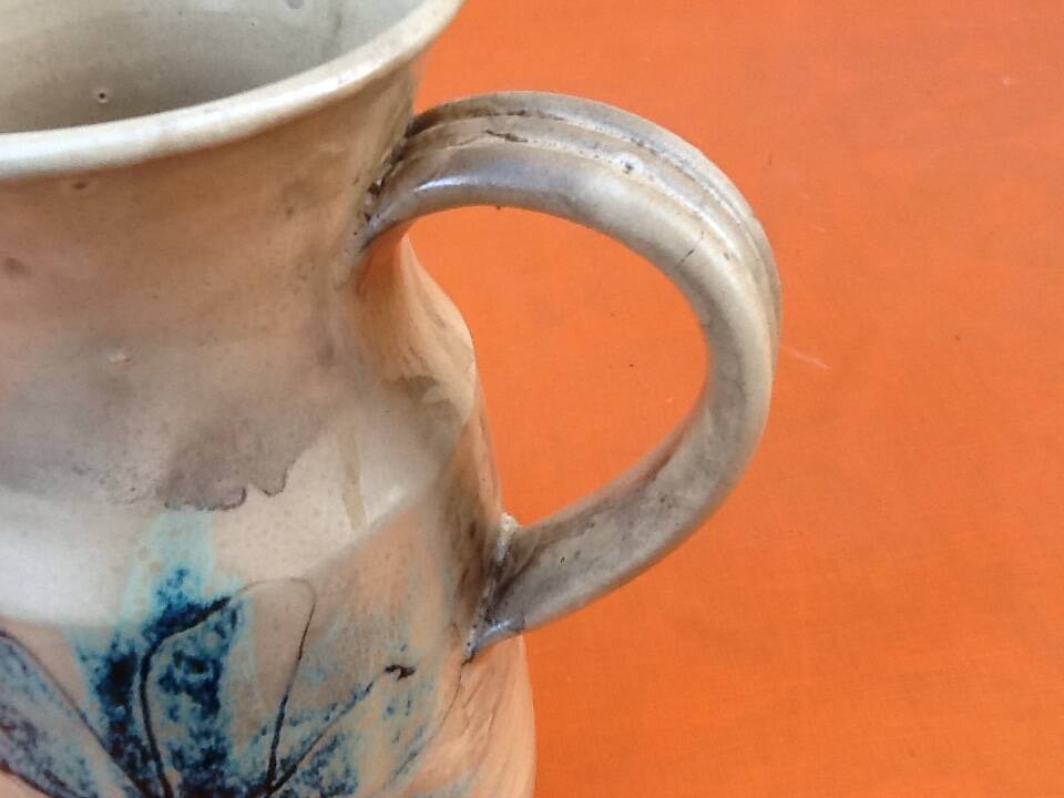 1960s Glazed terracotta pitcher with floral decoration