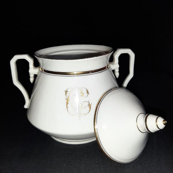 Porcelain sweetener and milk jug with cipher