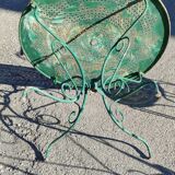 Garden table, two armchairs and a metal chair