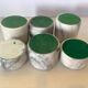 Six bougeoirs en marbre