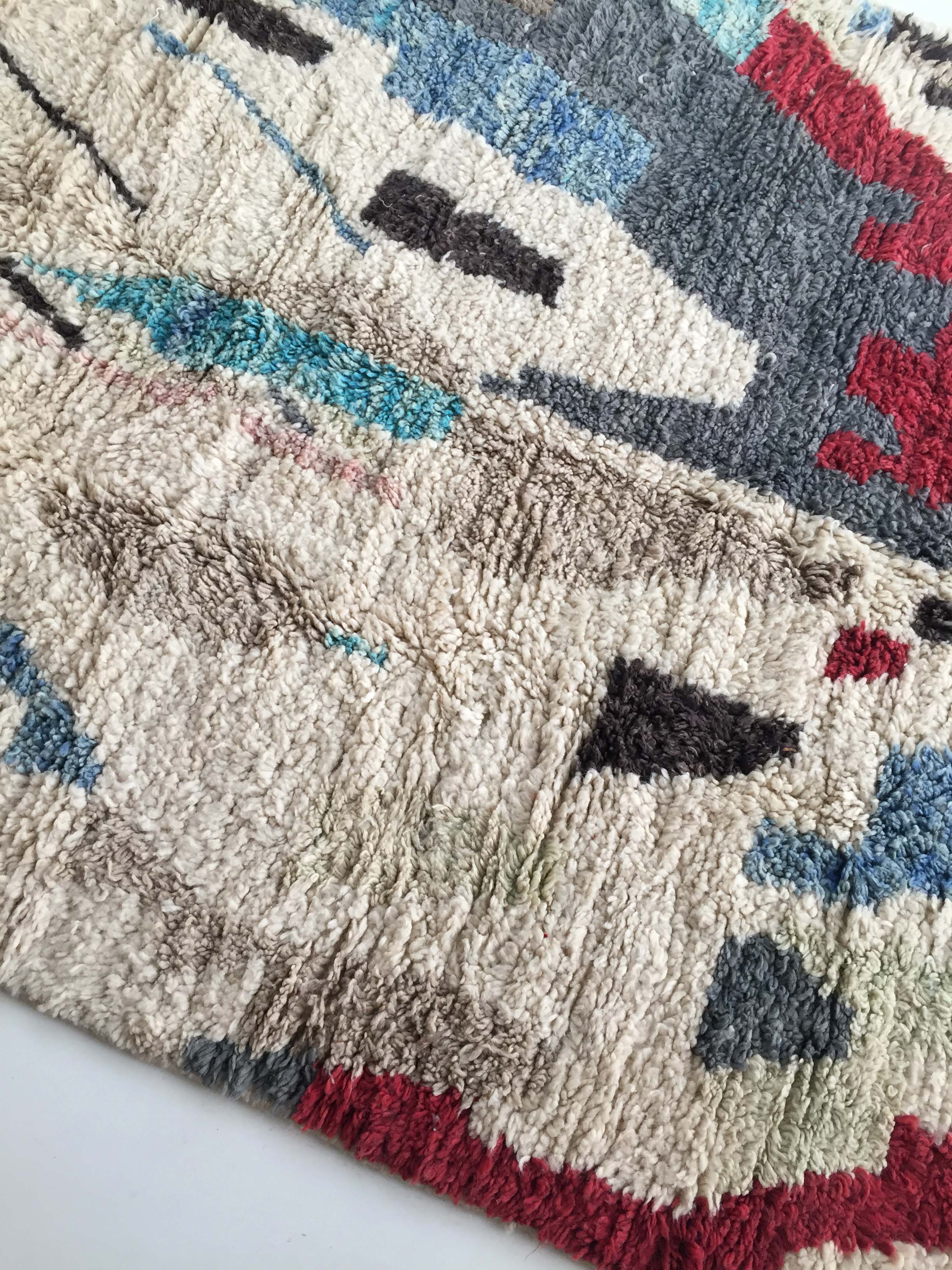 Moroccan Berber carpet Boujaad ecru with colorful patterns 228x157cm