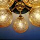 Large designer ceiling light in brass and amber crackled glass, 1970s.