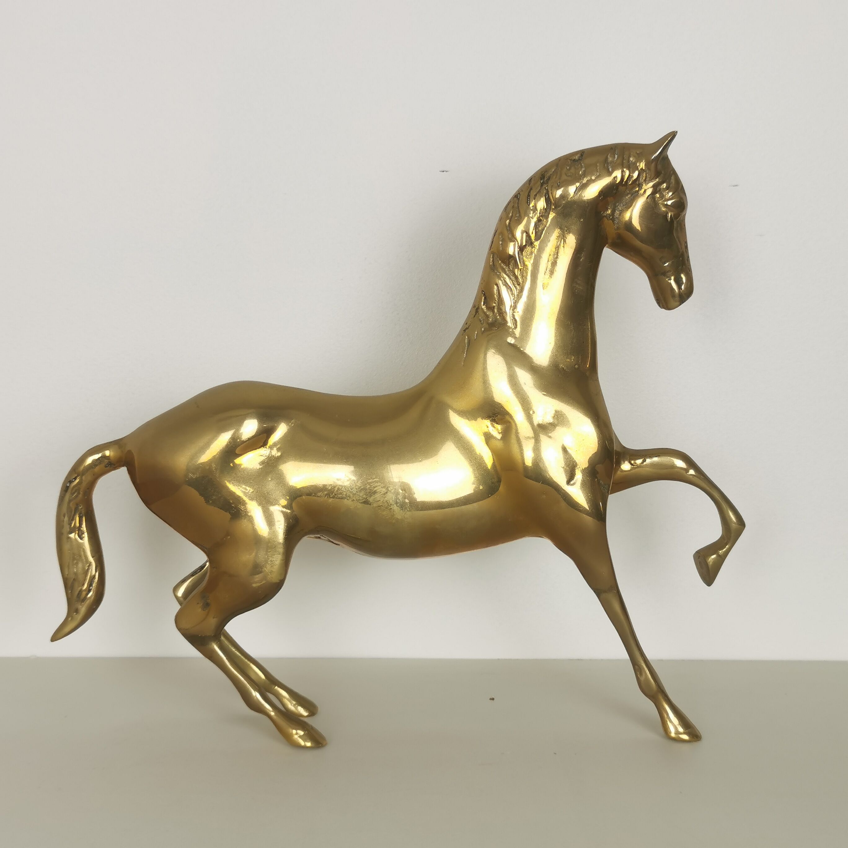 Brass horse