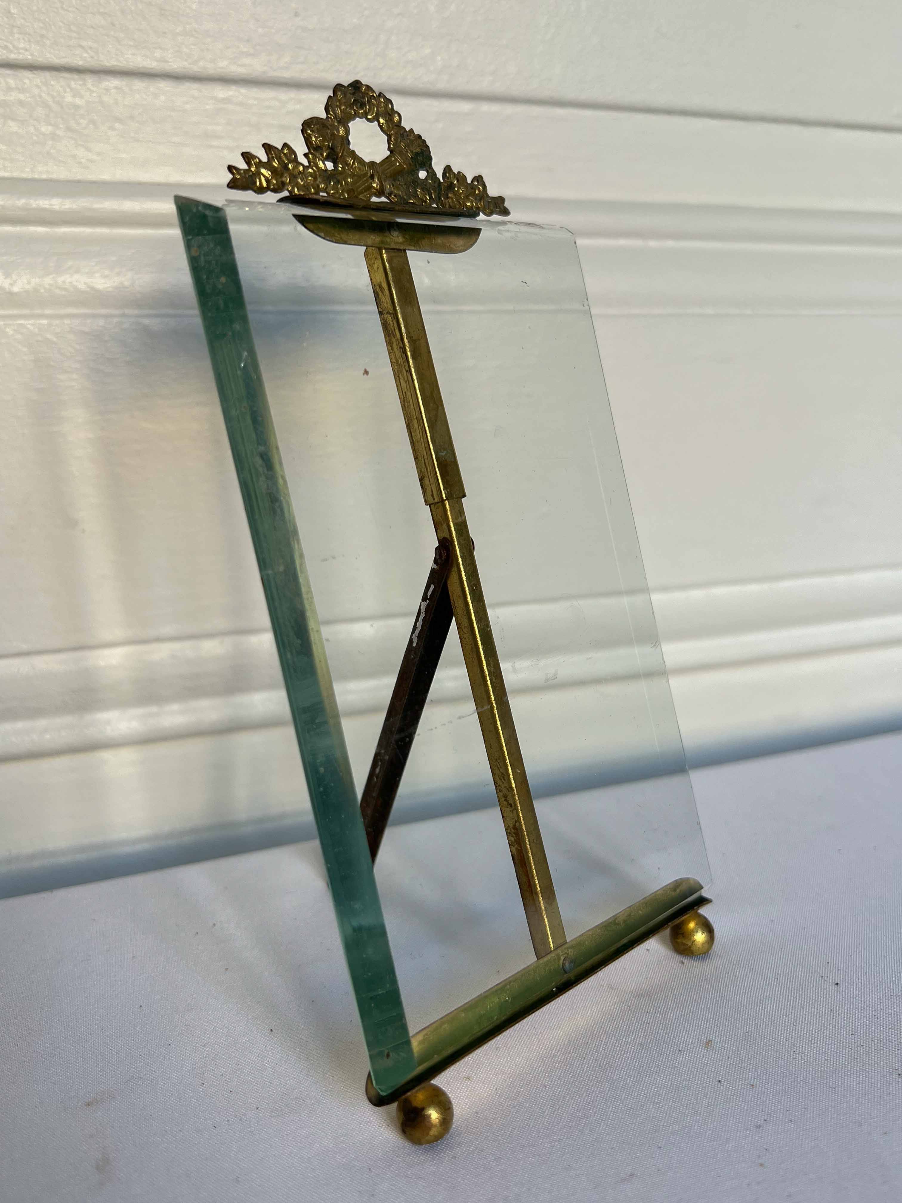 Brass frame and beveled glass