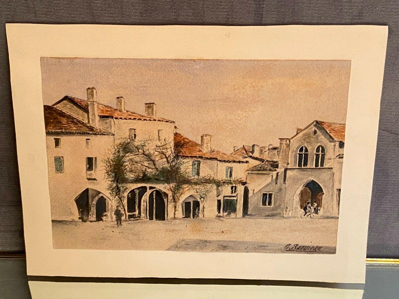 Watercolor signed Sarineau representing a view of a village