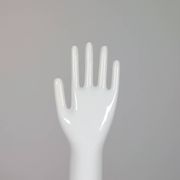 Pair of authentic vintage jewellery displays in industrial porcelain representing hands.