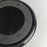 Perforated metal wastebasket