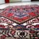 1950s handmade wool medallion rug, red and navy, 96 × 144 cm - 1C1290