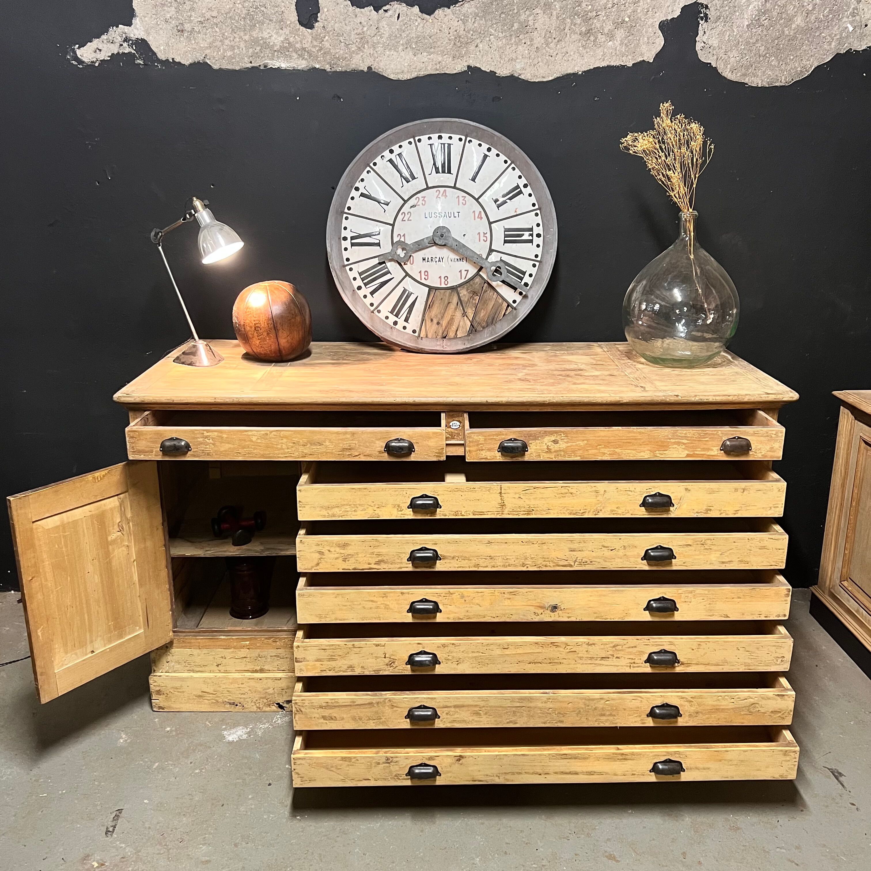 Old piece of furniture by trade with an architect's plan