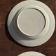 Set of 4 small dessert plates with a vintage stylised flower pattern.