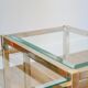 Set of three nesting coffee tables, gilt brass with beveled glass tops, 1980