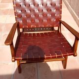 PAIR OF TEAK AND LEATHER ARMCHAIRS