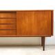 Danish teak sideboard with two sliding doors and 4 central drawers