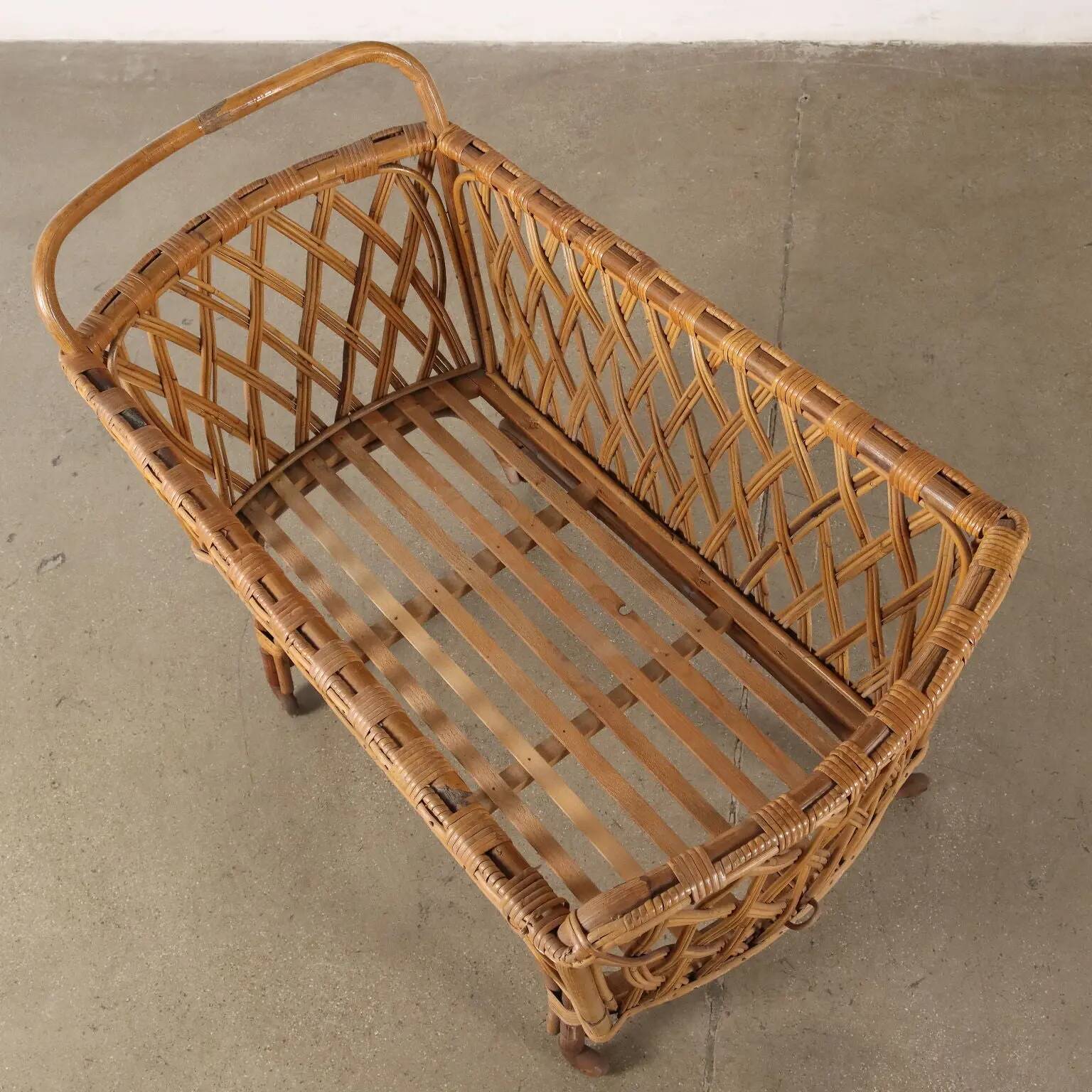 Vintage cradle from the 1960s, bamboo structure.