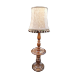 Turned wooden floor lamp with lampshade