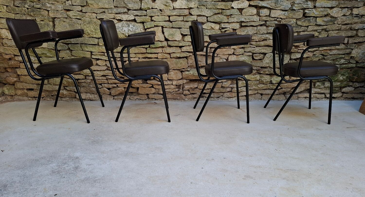 Brown faux leather armchairs