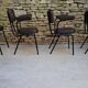 Brown faux leather armchairs