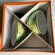 Two Hermès breakfast cups in their packaging