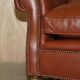Edwardian leather club canapé circa 1910 with feather cushions.