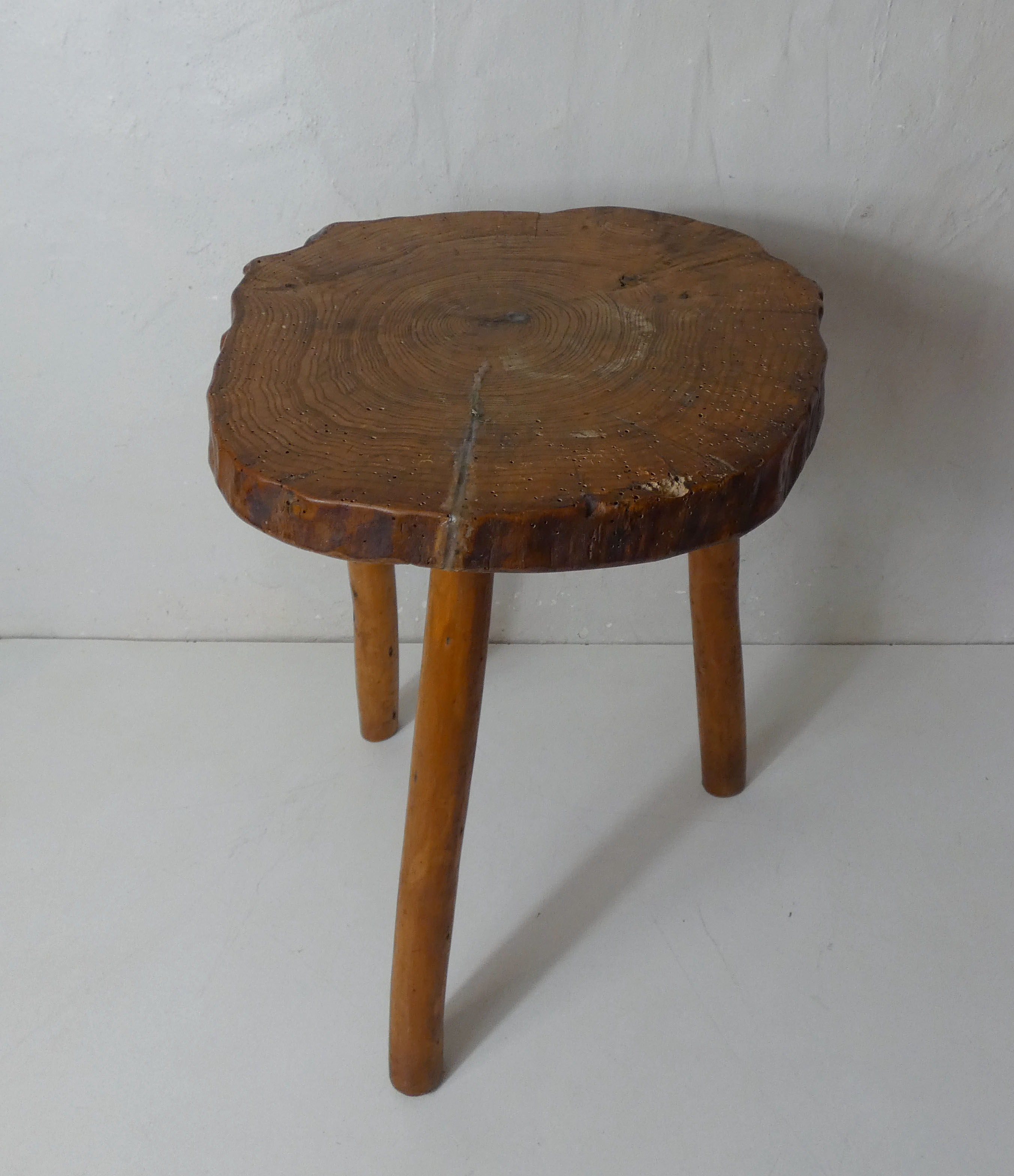 Brutalist side table tripod in vintage wood
