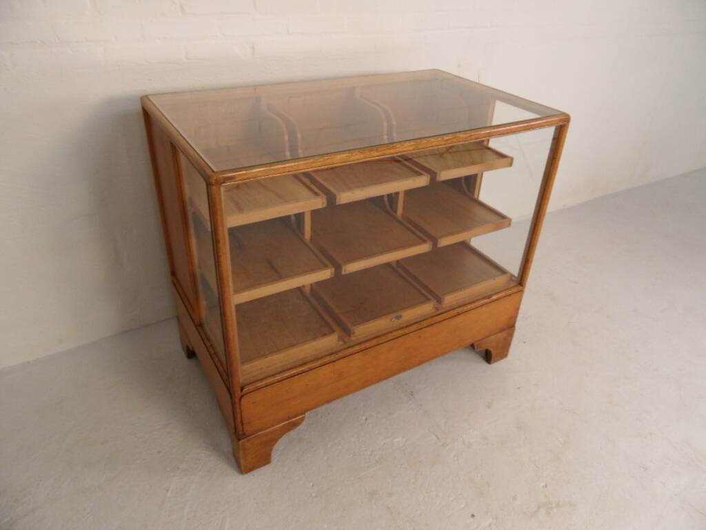 Antique oak store counter with drawers