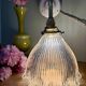 Elbow wall lamp with vintage holophane glass shade