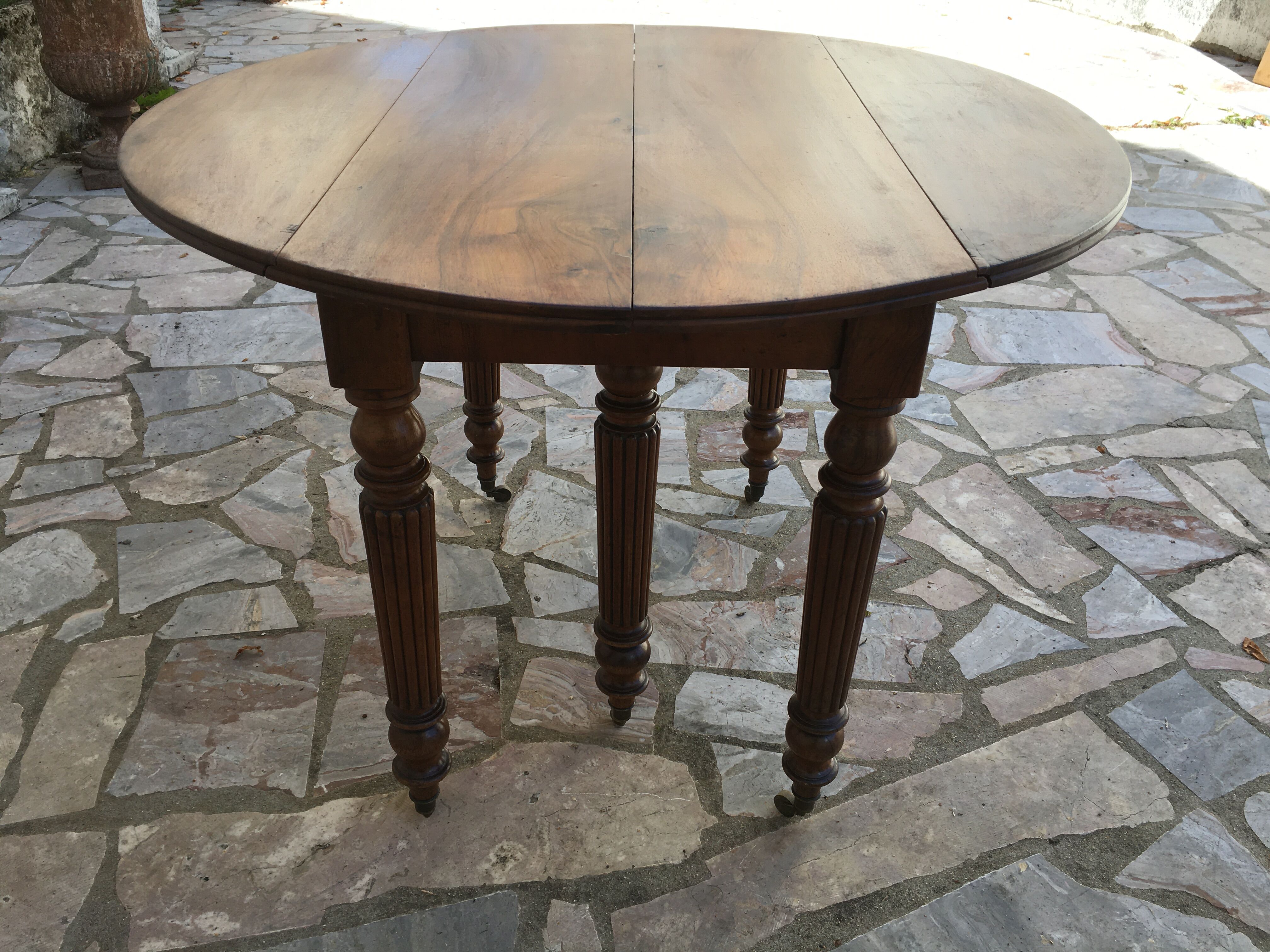 Round table 6 feet 3 solid walnut extensions