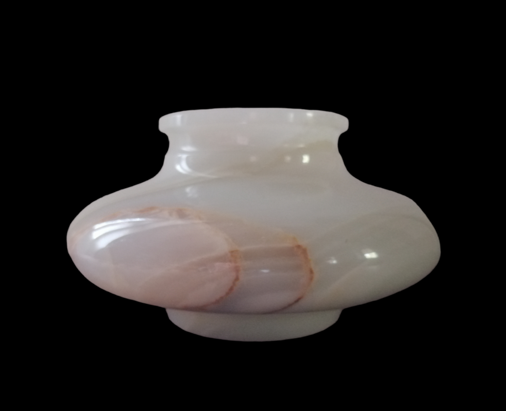 Flattened alabaster ball vase