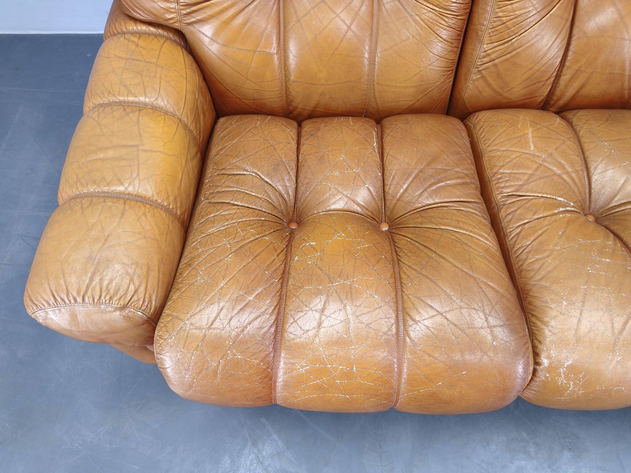 Three-seater sofa from the mid-century produced in Italy in the 1970s.