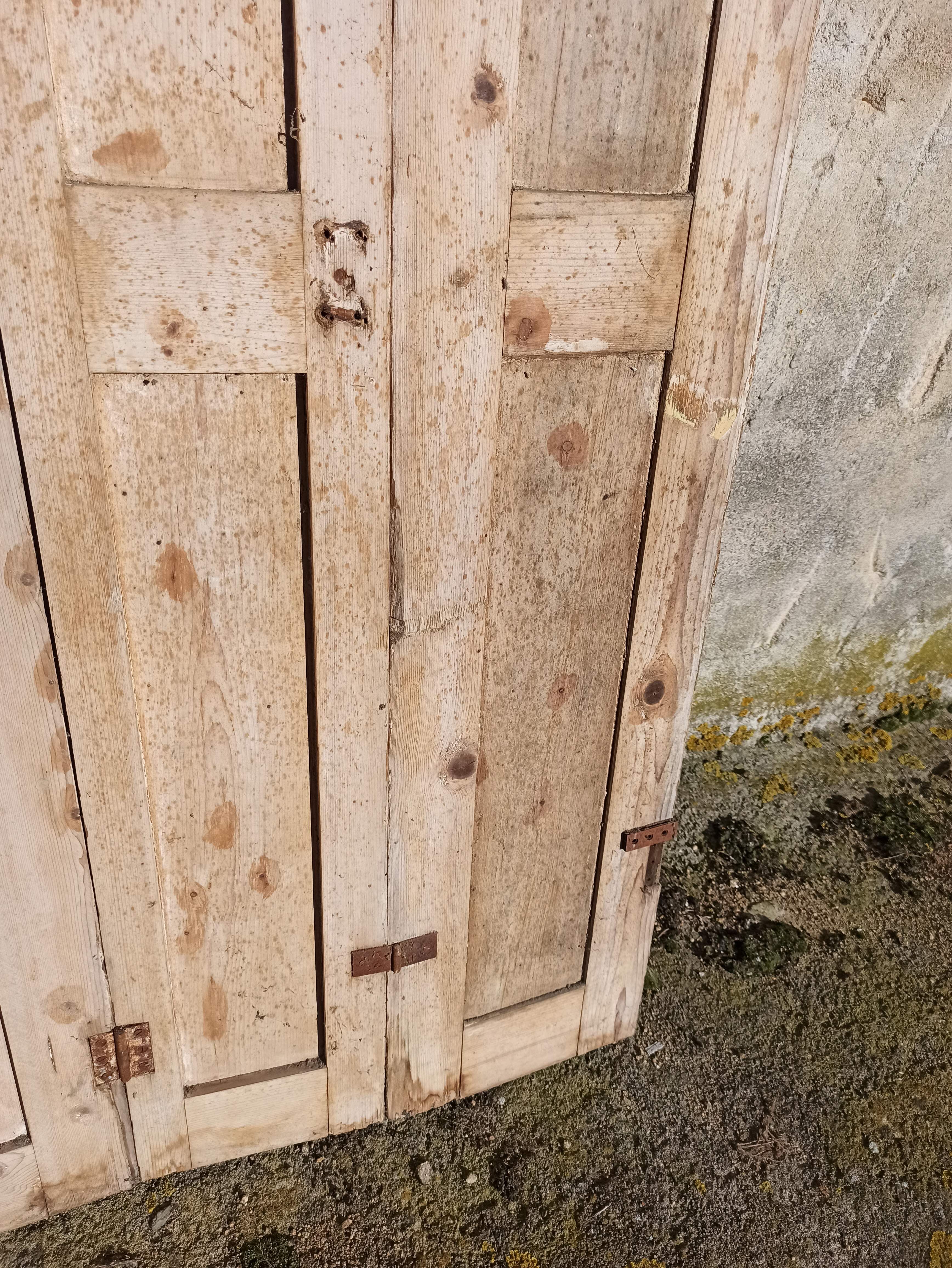 Old trio of wooden screen doors